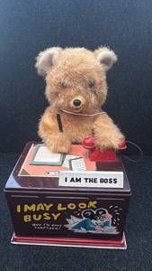 lot 11 image: Vintage Tin Toy Bear Telephone Operator