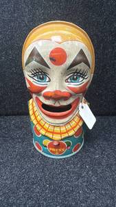 lot 13 image: Vintage Tin Clown Bank with Press Lever