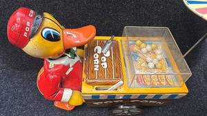 lot 19 image: Vintage Tin Toy Duck Popcorn Vendor with Parasol