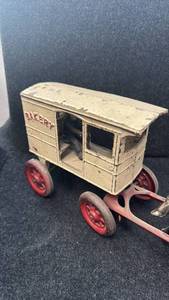 lot 21 image: Vintage Cast Iron Horse-Drawn Bakery Wagon Toy
