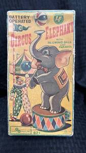 lot 25 image: Vintage Battery Operated Circus Elephant Toy with Blowing Ball