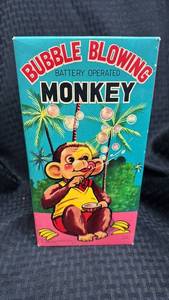 lot 26 image: Vintage Battery-Operated Bubble Blowing Monkey Toy with Original Box