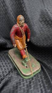 lot 48 image: Antique Woolsey Cast Iron Football Player, 8 Inches Tall