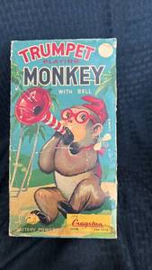 lot 62 image: Vintage Cragstan Trumpet Playing Monkey Toy with Original Box