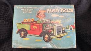 lot 64 image: Vintage Battery Operated Farm Truck Toy with Mystery Piston Action