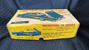 lot 65 image: Vintage Ford Fairlane 500 Skyliner Battery-Powered Toy Car