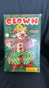 lot 66 image: Vintage Battery-Powered Clown Violinist Toy - Unverified Working Condition