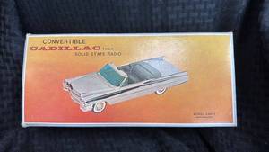 lot 72 image: Collectible 1959 Cadillac Convertible Solid State Radio - Gold Model