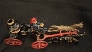 lot 78 image: Vintage Cast Iron Fire Pumper with Horses and Fireman