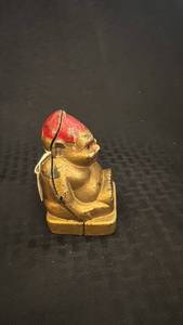 lot 105 image: Antique Cast Iron Buddha Coin Bank with Red Paint