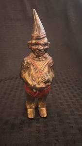 lot 106 image: Antique Cast Iron Clown Bank with Paint Loss
