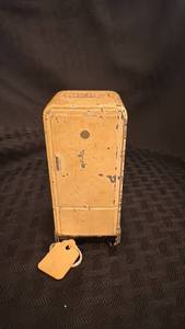 lot 110 image: Vintage Cast Iron Coin Bank with Paint Chipping