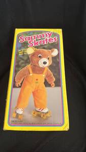 lot 128 image: Vintage Sammy Skates Talking Bear with Roller Skates