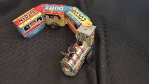 lot 142 image: Vintage Cocoa Puffs Tin Toy Train