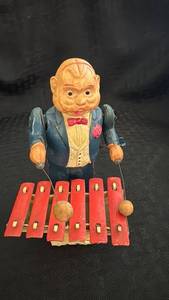 lot 148 image: Vintage Tin and Celluloid Wind-Up Toy Musician with Xylophone