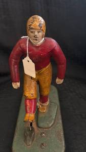 lot 165 image: Woolsey Antique Cast Iron Football Player Figurine with Base
