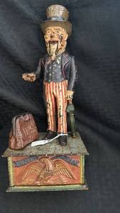 lot 171 image: Vintage Mechanical Uncle Sam Bank Cast Iron Coin Bank