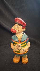 lot 174 image: Vintage Barnacle Bill Tin Toy with Wear
