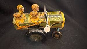 lot 177 image: Vintage Wind-Up Jumpin Jeep Tin Toy with Soldiers