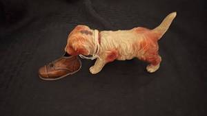 lot 184 image: Vintage Dog with Shoe Tin and Celluloid Figure
