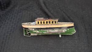 lot 186 image: Vintage Tin Toy Boat with Wear
