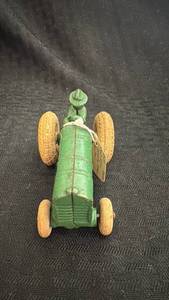 lot 198 image: Vintage Green Cast Iron Toy Tractor