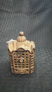 lot 226 image: Antique Cast Iron Mechanical Bank Building With Rustic Patina