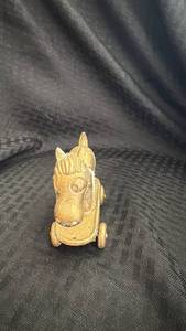 lot 245 image: Antique Cast Iron Horse Pull Toy with Wheels