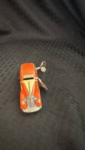lot 250 image: Vintage Tricky Taxi Wind-Up Toy Car with Key