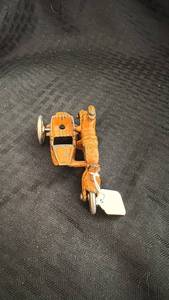 lot 252 image: Vintage Orange Toy Motorcycle with Sidecar