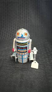 lot 271 image: Vintage Wind-Up Robot Tin Toy with Surface Wear