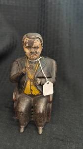 lot 276 image: Antique Cast Iron Mechanical Bank with Seated Figure