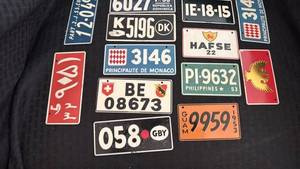 lot 279 image: Collection of Vintage License Plates from Various Countries