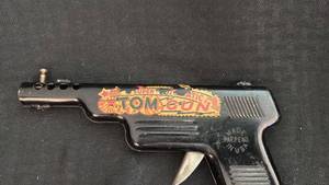 lot 297 image: Vintage Super Auto Tom Gun Toy with Decal Wear