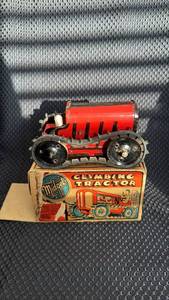 lot 304 image: Vintage Marx Midget Climbing Tractor Wind-Up Toy with Original Box