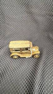 lot 318 image: Vintage Die-Cast Model Car with Rustic Finish