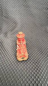lot 320 image: Vintage Red Cast Iron Toy Car with Paint Wear