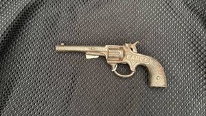 lot 326 image: Vintage Cast Iron Cap Gun with Rust Accents
