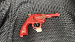 lot 334 image: Vintage Wyandotte Steel Cap Gun with Red Finish