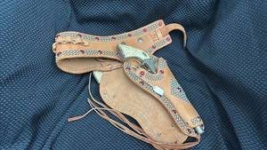 lot 348 image: Gene Autry Leather Gun Holster with Toy Revolver Set