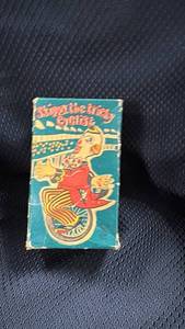 lot 361 image: Vintage Wind-Up Skippy the Tricky Cyclist Toy