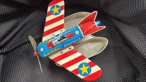 lot 363 image: Vintage Tin Toy Airplane with Striped Wings