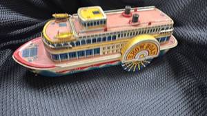 lot 364 image: Vintage Tin Showboat Wind-Up Toy with Surface Wear