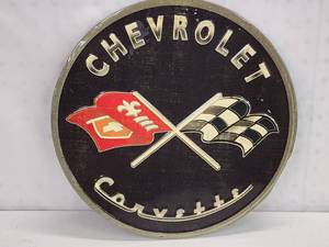 lot 82 image: Chevrolet Corvette Round Pressed Metal Sign