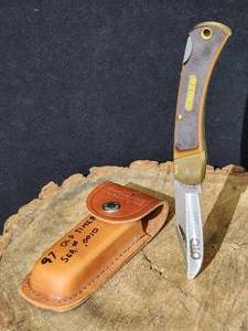 lot 144 image: 1997 OTC Commemorative Schrade Old Timer Locking Blade Knife Serial # 0010