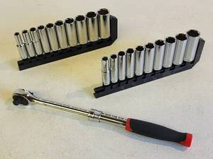lot 379 image: 14  38 Combo Ratched with Standard and Metric Deep Well Sockets