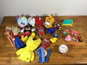 lot 75 image: Lot of toys - Tiger flashlight, Kissing pigs, Barbie, Mickey Mouse, Baseball, Mini-stuffed animals, little animals and people