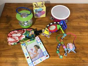 lot 76 image: Toys, Baby Photo Frame, Makeup bag, pin, tambourine