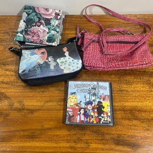 lot 109 image: Lot Misc. PurseHandbag, Disney Purse, Photo Album, DVD Set of Kids Movies