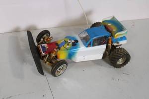 lot 21 image: Used Remote Control Buggy with Cartoon Motif